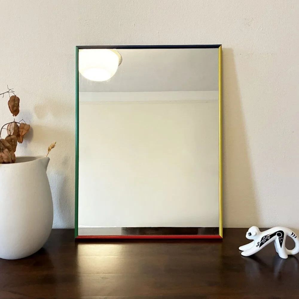 Accent Mirror With an MCM-style 4 colors Blue/Red/Yellow/Teal Metal Frame.